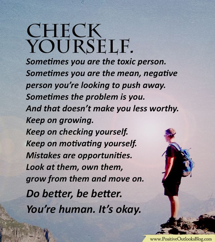 Man walking down road at sunset